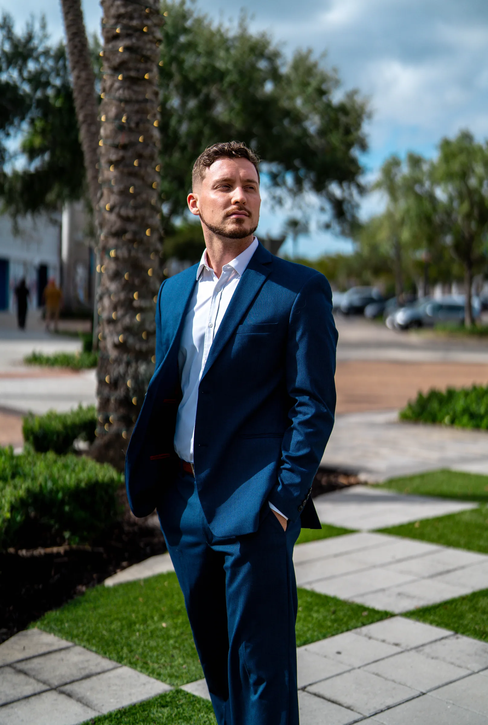 Dr. Jarod Ward, Fort Myers chiropractor, in a navy suit